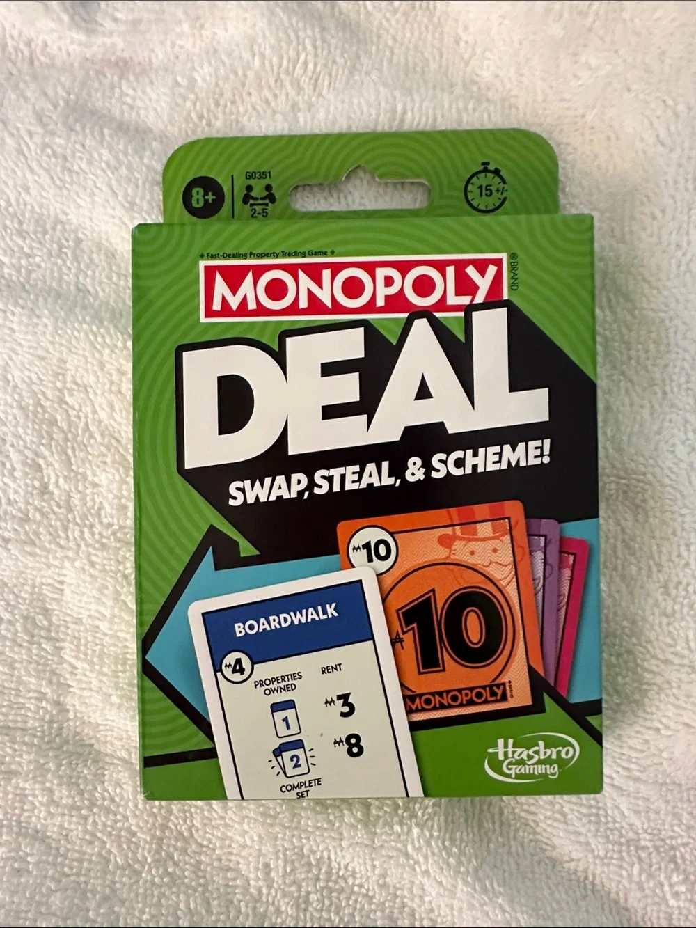 Hasbro MONOPOLY DEAL Card Game - Green Packaging with Multicolored Cards